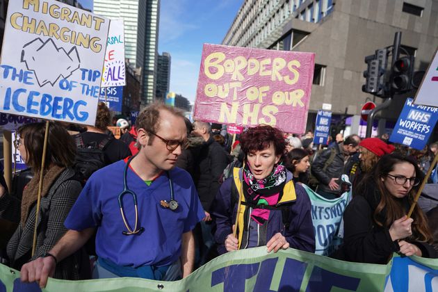 People gather on Warren Street in London, ahead of a Support the Strikes march in solidarity with nurses, junior doctors and other NHS staff following recent strikes over pay and conditions. Picture date: Saturday March 11, 2023.