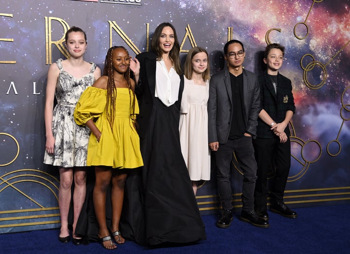 Shiloh Jolie-Pitt, Zahara Jolie-Pitt, Angelina Jolie, Vivienne Jolie-Pitt, Maddox Jolie-Pitt and Knox Jolie-Pitt attend the "The Eternals" U.K. premiere on Oct. 27, 2021.