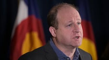 Colorado Governor Signs Gun Control Bills After Latest Massacre
