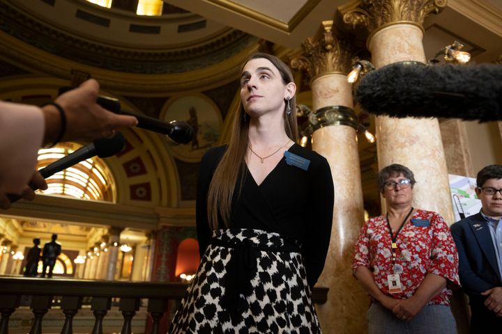 Rep. Zooey Zephyr talks with the media after a House of Representatives session at the Montana State Capitol in Helena, Mont., on Wednesday, April 26, 2023. Republicans in Montana's House of Representatives voted to ban Rep. Zephyr from the chamber, following her support for protesters who disrupted the body's proceedings earlier in the week. (AP Photo/Tommy Martino)