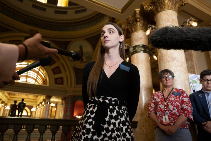 Rep. Zooey Zephyr talks with the media after a House of Representatives session at the Montana State Capitol in Helena, Mont., on Wednesday, April 26, 2023. Republicans in Montana's House of Representatives voted to ban Rep. Zephyr from the chamber, following her support for protesters who disrupted the body's proceedings earlier in the week. (AP Photo/Tommy Martino)