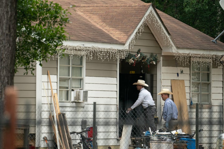Law enforcement respond to a crime scene Saturday where five people, including an 8-year-old child, were killed after a shooting inside a home in Cleveland, Texas. The alleged gunman, who is not yet in custody, used an AR-15 style rifle to shoot his neighbors and left at least three others injured.