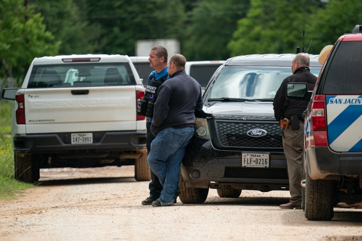 Law enforcement respond to a crime scene where five people, including an 8-year-old child, were killed after a shooting inside a home in Cleveland, Texas.