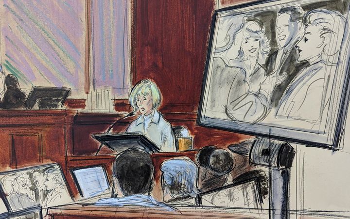 In this courtroom sketch, in Federal Court, in New York, Thursday, April 27, 2023, E. Jean Carroll, center, testifies on the witness stand as a photo of her and Donald Trump, along with his wife Ivana and Carroll's former husband, is shown on a screen. The photo was taken prior to the alleged assault. The jury is in the foreground. 