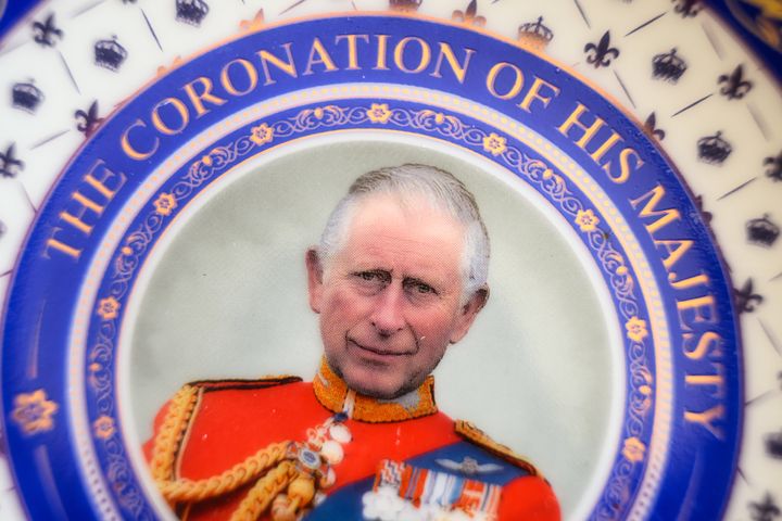 LONDON, ENGLAND - APRIL 29: In this photo illustration, a souvenir collectible plate marking the Coronation of King Charles III is seen on April 29, 2023 in London, England. The Coronation of King Charles III and The Queen Consort will take place on May 6, part of a three-day celebration. (Photo by Leon Neal/Getty Images)