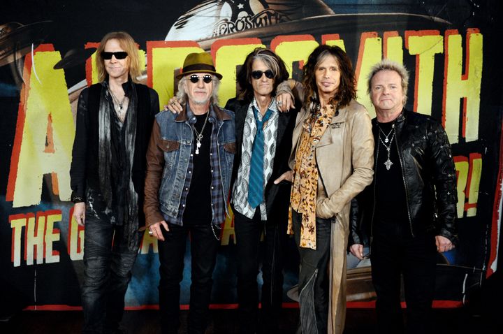 Tom Hamilton, Brad Whitford, Joe Perry, Steven Tyler and Joey Kramer of Aerosmith pose at the press junket to announce their new album "Music From Another Dimension" on Sept.18, 2012 in West Hollywood.