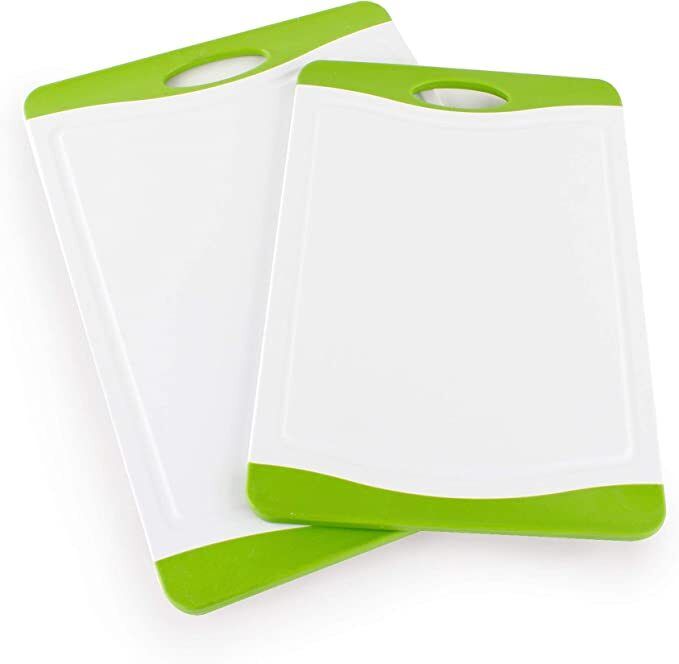 A set of 2 antibacterial cutting boards with juice grooves
