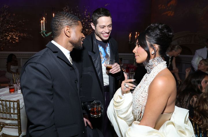 Kardashian wore a Schiaparelli gown of pearls and crystals. Usher and Pete Davidson wore tuxedos and smiles.