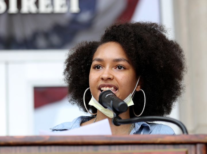 Anya Dillard, speaking above during a Black Lives Matter protest in 2020, said that when she feels discouraged, "I remind myself that I am a living, breathing manifestation of my ancestors’ wildest dream."