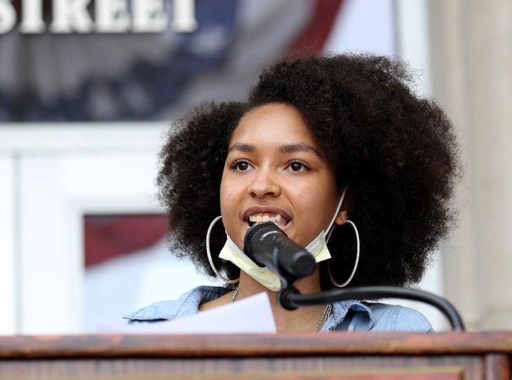 Anya Dillard, speaking above during a Black Lives Matter protest in 2020, said that when she feels discouraged, "I remind myself that I am a living, breathing manifestation of my ancestors’ wildest dream."