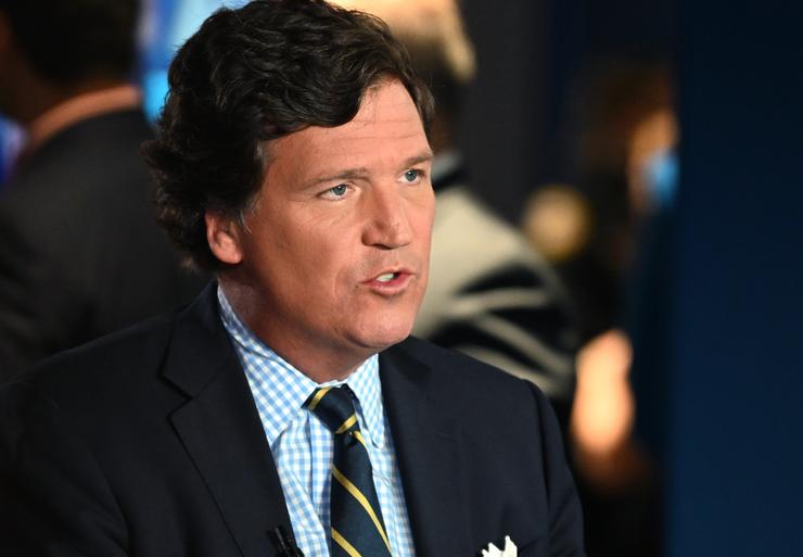 Tucker Carlson, shown here in November at the Fox Nation Patriot Awards in Florida, was let go from Fox News last week.