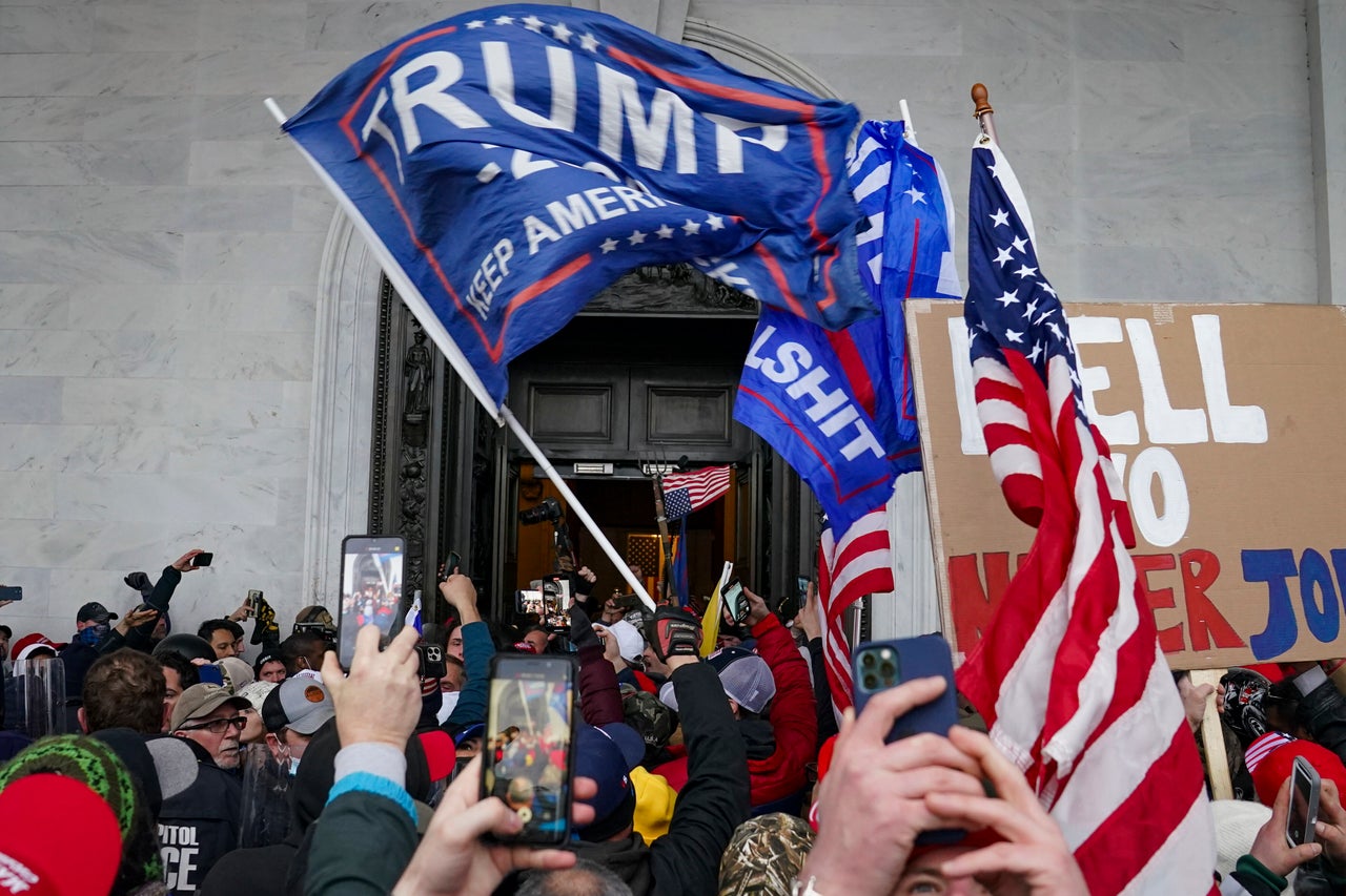 In this Jan. 6, 2021, file photo, rioters break into the Capitol in Washington. 