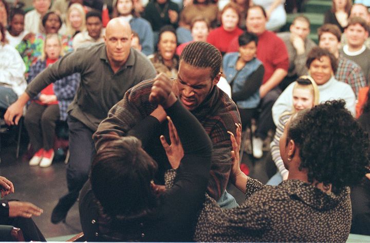 A guest attacks his romantic partner after learning they are transgender on the Dec. 17, 1997 episode of "The Jerry Springer Show."