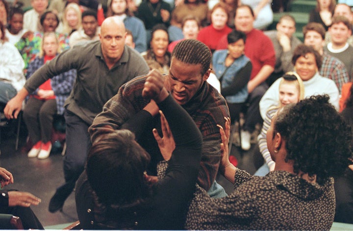 A guest attacks his romantic partner after learning they are transgender on the Dec. 17, 1997 episode of "The Jerry Springer Show."