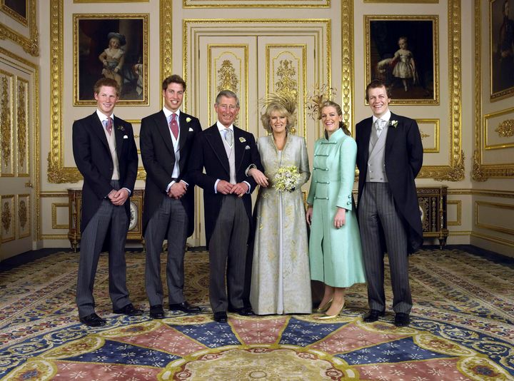 Charles and Camilla with their children (L-R) Prince Harry, Prince William, Laura Parker Bowles and Tom Parker Bowles, in the White Drawing Room at Windsor Castle on April 9, 2005, after their wedding ceremony. 