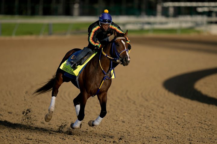 Kentucky Derby hopeful Lord Miles, a horse that's trained by Joseph, is seen working out at Churchill Downs on Tuesday.