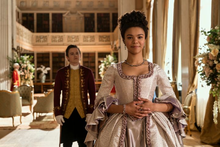 Sam Clemmett as Young Brimsley and India Amarteifio as Young Queen Charlotte in "Queen Charlotte: A Bridgerton Story."