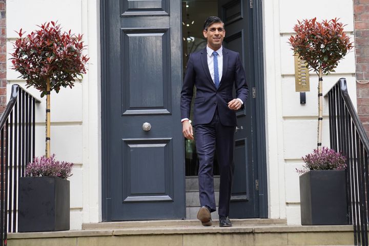 Prime Minister Rishi Sunak leaves the Conservative Party headquarters in central London, after the party suffered council losses in the local elections. 