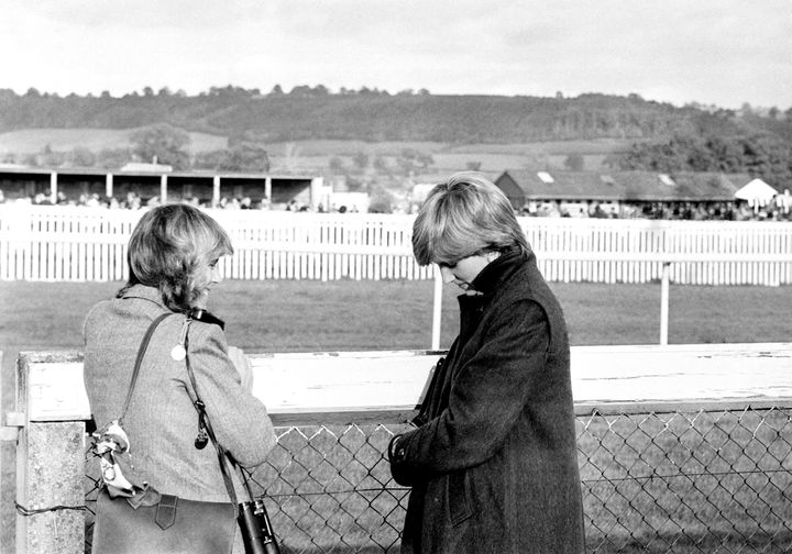 Camilla Parker-Bowles (left) and Lady Diana Spencer (later the Princess of Wales) at Ludlow racecourse watching the Amateur Riders Handicap Steeplechase in which the Prince of Wales was competing.