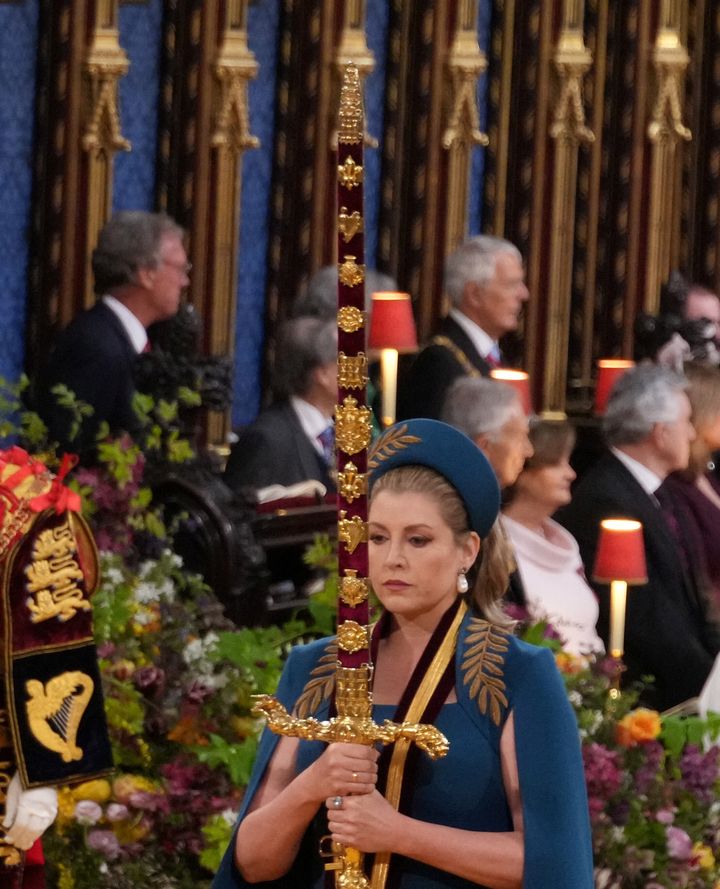Lord President of the Council, Penny Mordaunt, carrying the Sword of State, in the procession through Westminster Abbey ahead of the coronation ceremony of King Charles III and Queen Camilla in London.