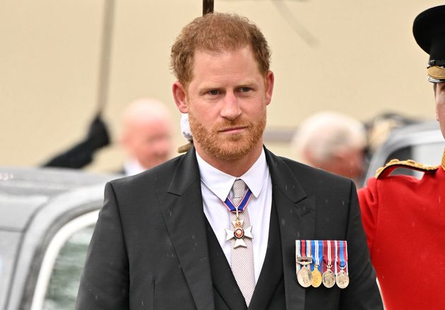 Prince Harry, Duke of Sussex arrives for the Coronation of King Charles III and Queen Camilla at Westminster Abbey.