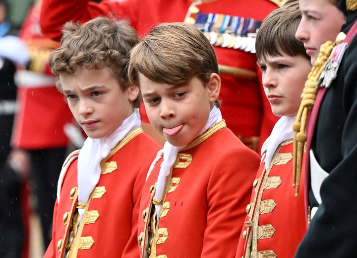 Prince George reacts on the day of coronation of Britain's King Charles and Queen Camilla's coronation ceremony at Westminster Abbey in London, Britain May 6, 2023. 
