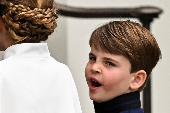 Prince Louis yawns as he arrives at Westminster Abbey.
