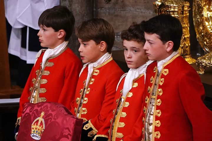 Prince George with his fellow page boys Lord Oliver Cholmondley, Nicholas Barclay and Ralph Tollemache.