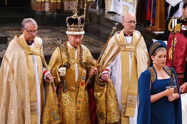 Penny Mordaunt leads King Charles III wearing the St Edward's Crown during his coronation ceremony in Westminster Abbey.