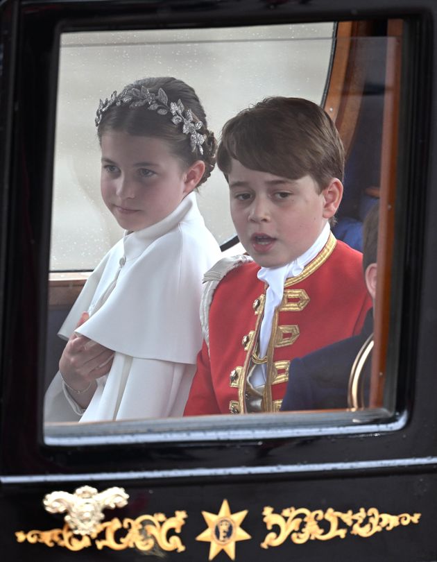 Prince George looks tired after fulfilling his duties as Page of Honour.