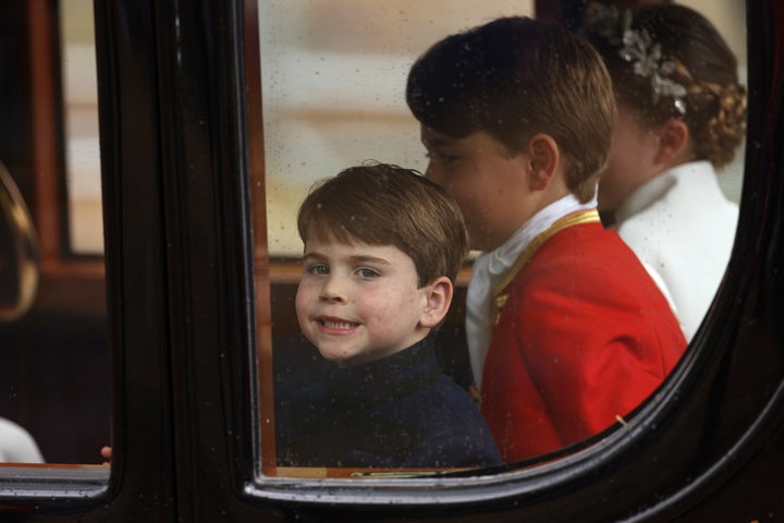 A victorious smile as the carriage moves on.