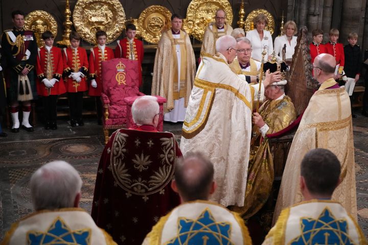 The moment Charles was crowned by the Archbishop of Canterbury. 