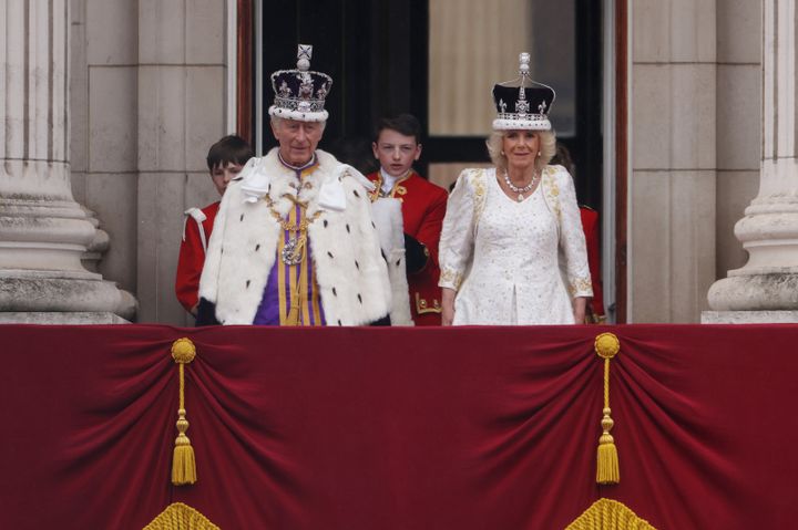King Charles III, Camilla, Queen Consort can be seen on the Buckingham Palace balcony ahead of the flypast.