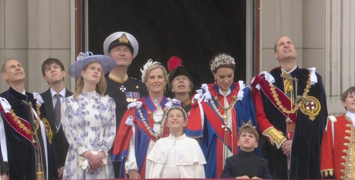 Prince Louis looked less than impressed as waves of helicopters flew over Buckingham Palace.