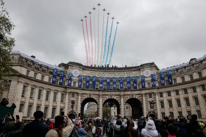 The Red Arrows fly past. 