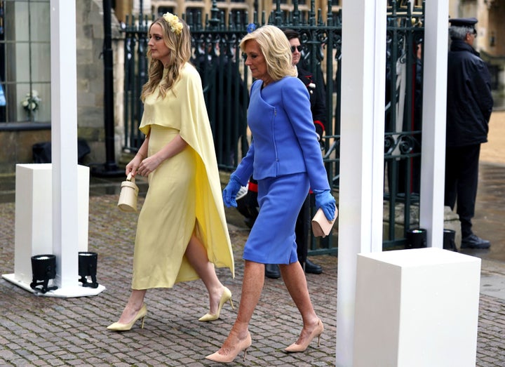 First Lady Jill Biden and her granddaughter Finnegan arrive at Westminster Abbey ahead of the coronation of King Charles III and Camilla, the Queen Consort, on Saturday.