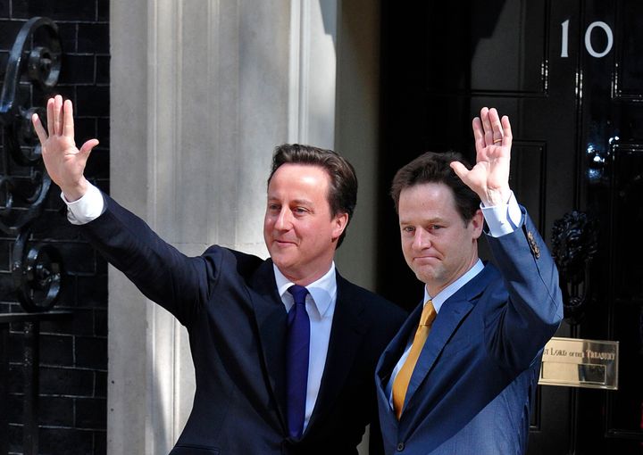 Former prime minister David Cameron and former deputy prime minister Nick Clegg outside 10 Downing Street in London, on May 12, 2010. 