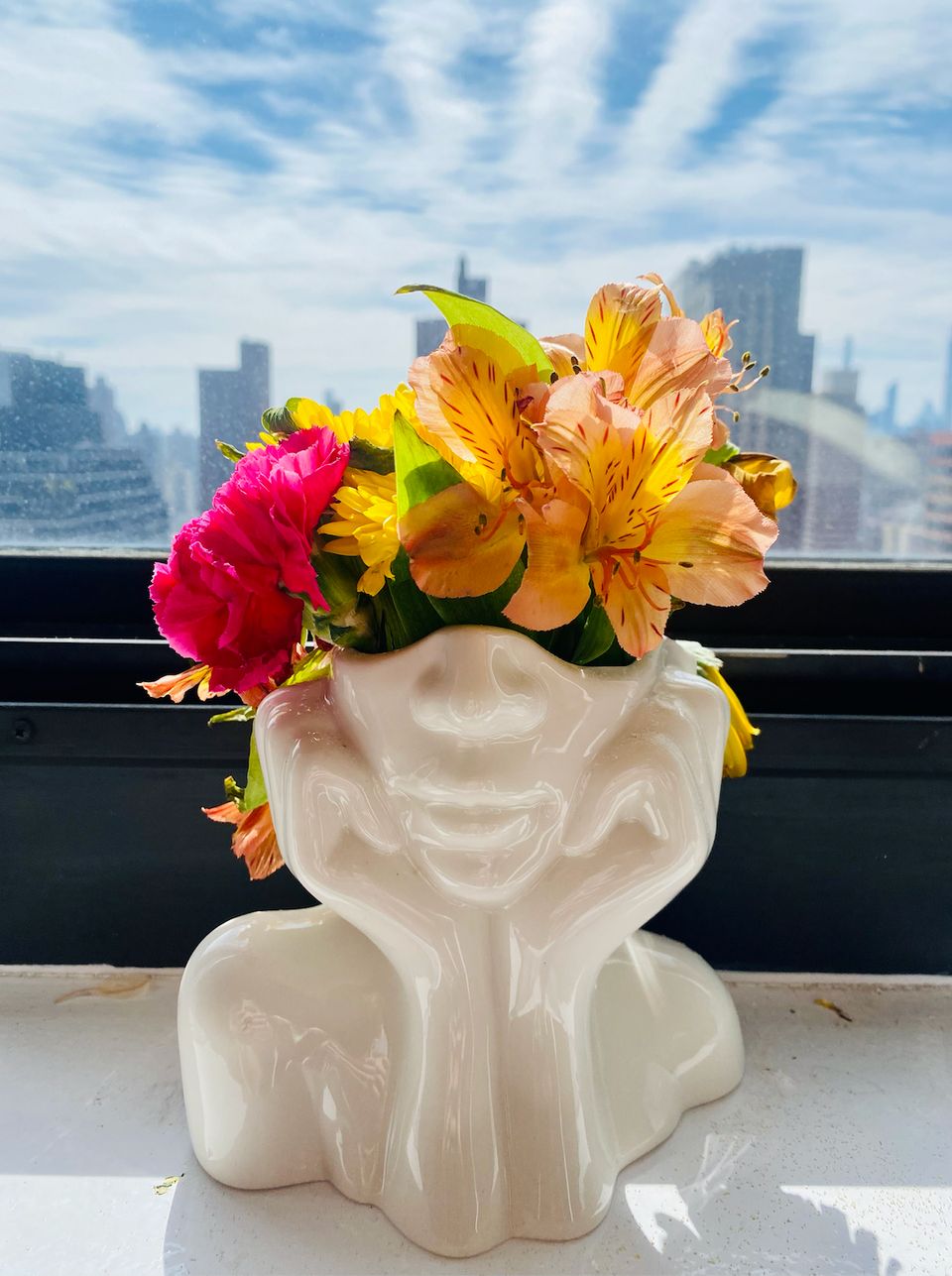 A thoughtful face vase perfect for daydreamers