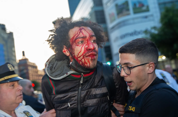 Police slammed a man who was taking part in a Jordan Neely vigil to the ground on Houston Street and then arrested him, May 8, 2023.