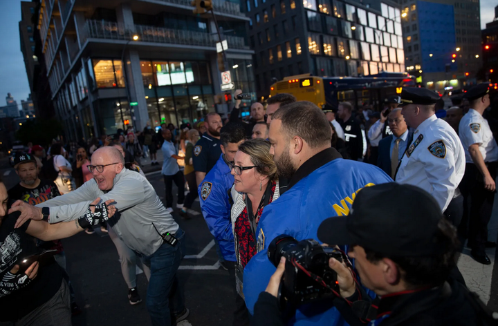 Police arrest a photojournalist during protesters for Jordan Neely outside the Broadway-Lafayette station, May 8, 2023.