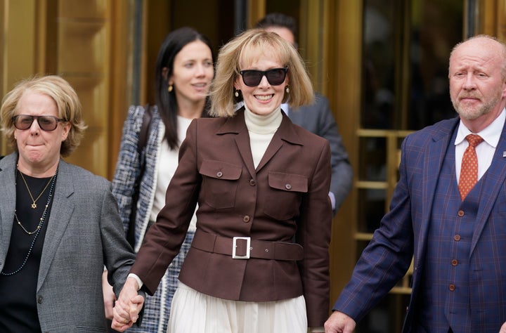 Carroll (center) walks out of court after the jury found Trump liable for sexually abusing the advice columnist in 1996.