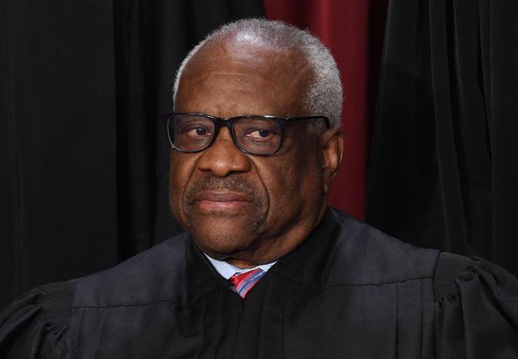 Supreme Court Justice Clarence Thomas poses for the official photo at the Supreme Court in Washington, D.C., on Oct. 7, 2022.