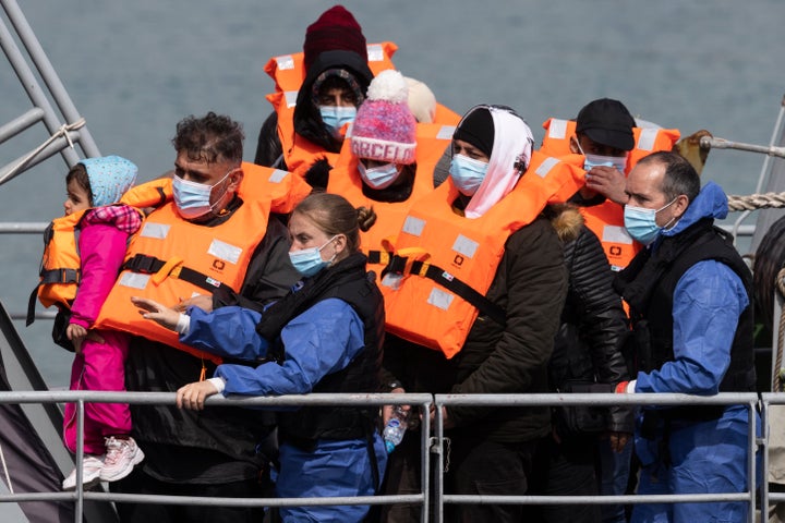 Migrants arrive at Dover port after being picked up in the channel by the border force on April 14, 2022 in Dover, England.