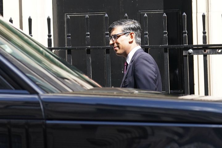 Rishi Sunak leaves 10 Downing Street to go to PMQs.