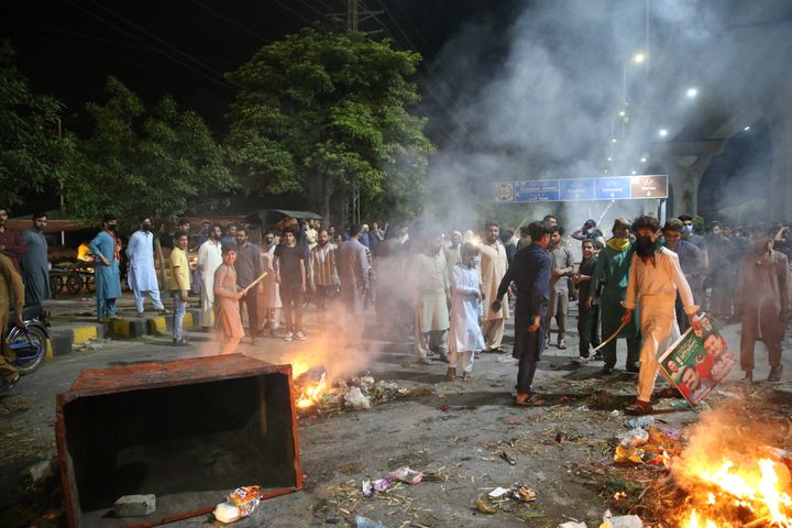 ISLAMABAD, PAKISTAN, MAY 09: Protesters burned tires and other materials to block roads as the supporters of Former Prime Minister Imran Khan and political party Pakistan Tehreek-e-Insaf (PTI) held a protest against the arrest of their leader Imran Khan, in Peshawar, Pakistan on May 09, 2023. (Photo by Muhammed Semih Ugurlu/Anadolu Agency via Getty Images)