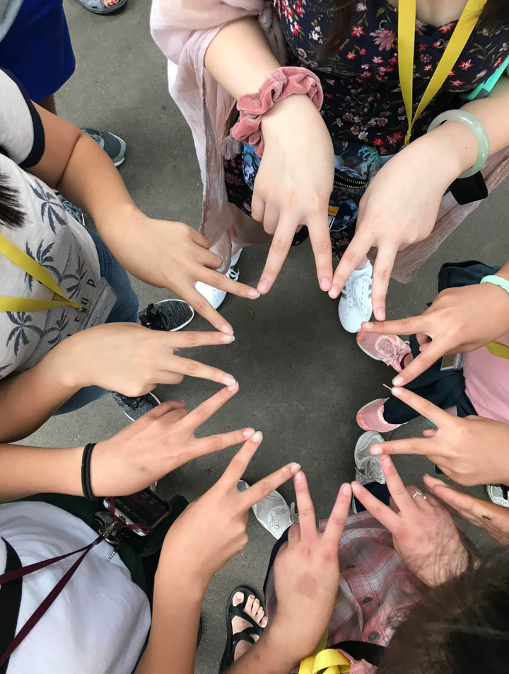 The author and the adoptee friends she made. “We were having so much fun at that point in our trip and were always asking our parents to take pictures of us together,” she writes.