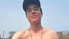 Elliot Page Revels In ‘Transjoy’ While Soaking Up The Sun