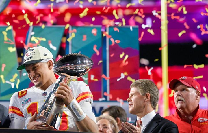Kansas City Chiefs quarterback Patrick Mahomes hoists the Lombardi Trophy after leading the Chiefs to a Super Bowl LVII victory, 38-35, over the Philadelphia Eagles on Sunday, Feb. 12, 2023, at State Farm Stadium in Glendale, Arizona.