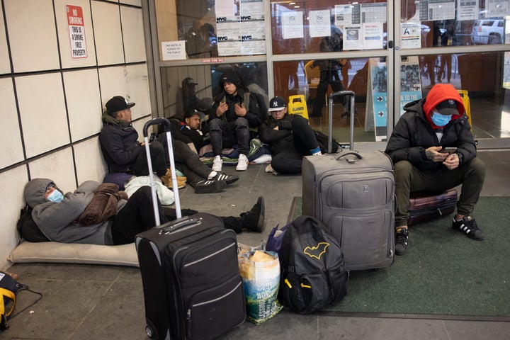 Venezuelan migrants who were bused to New York City from the Texas border are seen in midtown Manhattan in January after being kicked out of a hotel and refusing to go to a city-run migrant shelter in Brooklyn