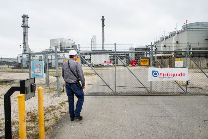 Manager John Jackson walks through the gate at a hydrogen plant on April 13, 2022, in La Porte, Texas.